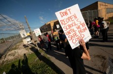 মিশিগানে স্কুল চালুর প্রতিবাদ বিক্ষোভে ১১ জন গ্রেপ্তার